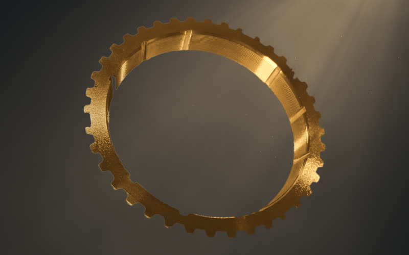 A JAC brass synchronizer ring with a measuring line across it